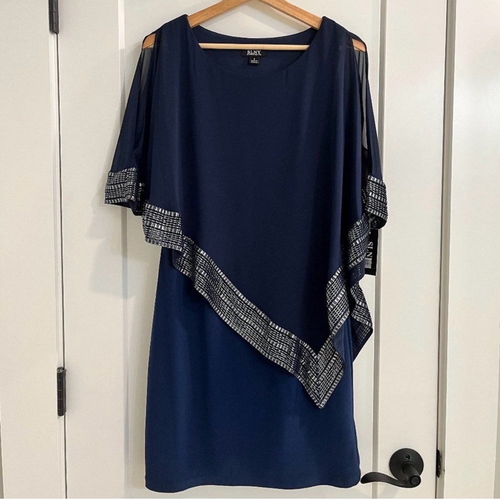 SLNY Navy Blue Asymmetrical Chiffon Popover Cape Cocktail Dress With Silver Trim